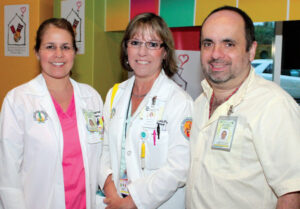 Dra. Juanita Lebrón, Dra. Inés García, Dr. Gilberto Puig.